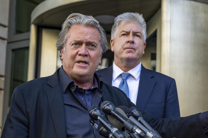 Steve Bannon speaks to the media as his lawyer Matthew Evan Corcoran listens after his trial for contempt of Congress began at the U.S. District Courthouse on July 19 in Washington, D.C.