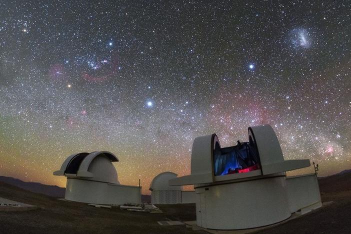 The telescopes of the SPECULOOS Southern Observatory in the Atacama Desert, Chile. The telescopes were used to confirm and characterize a new planet discovered by NASA, which led to the discovery of another nearby planet.