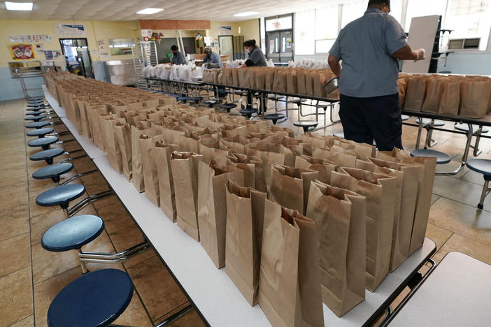 Jefferson County School District Food Service Department staff arrange some of the hundreds of free lunches that was given to students on March 3, 2021 in Fayette, Miss. As one of the most food insecure counties in the United States, many families and their children come to depend on the free meals as their only means of daily sustenance.