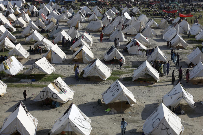 Temporary housing is constructed for flood victims, in Larkana District, of Sindh, Pakistan, Thursday, Sept. 8, 2022.