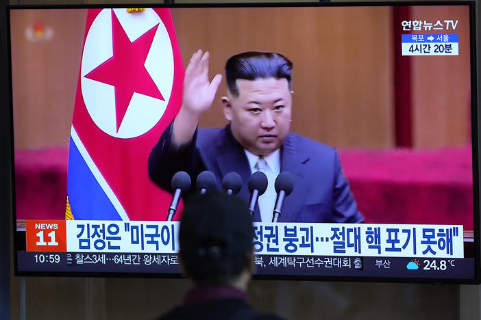 A man watches a TV screen showing a news program reporting with a file footage of North Korean leader Kim Jong Un, at the Seoul Railway Station in Seoul, South Korea, Friday, Sept. 9, 2022.