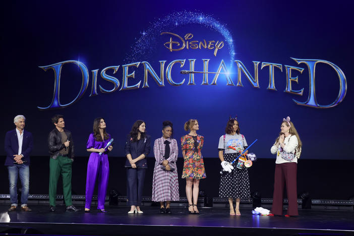 <em>Disenchanted</em> cast members Patrick Dempsey, James Marsden, Idina Menzel, Gabriella Baldacchino, Yvette Nicole Brown, Jayma Mays, Maya Rudolph and Amy Adams appear onstage Friday during the D23 Expo 2022 in Anaheim, Calif.