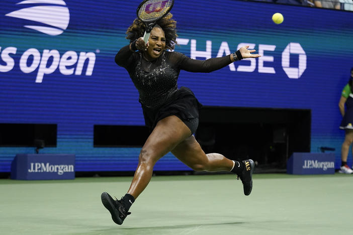 Serena Williams, of the United States, returns a shot to Ajla Tomljanovic, of Australia, during the third round of the U.S. Open tennis championships, Friday, Sept. 2, 2022, in New York. Williams' third-round defeat at by Ajla Tomljanovic had the largest audience of any tennis match in ESPN's 43-year history.