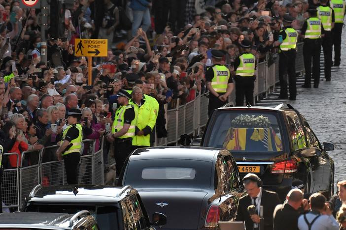 The hearse carrying the coffin of Queen Elizabeth II, leaves from from St Giles' Cathedral in Edinburgh, Scotland.