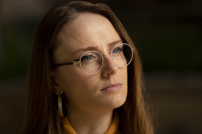 Charlotte Bennett, a former health policy aide to former Gov. Andrew Cuomo, pauses during an interview in New York on Oct. 12, 2021. Bennett sued Cuomo on Wednesday, saying he sexually harassed her then smeared her reputation.