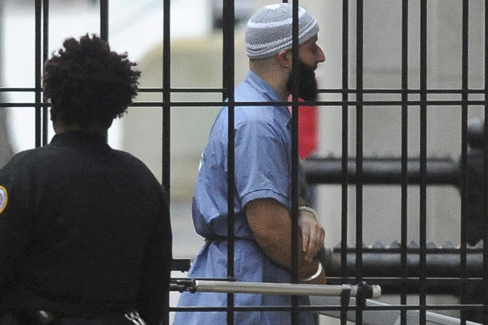 Adnan Syed enters a Baltimore courthouse prior to a hearing on Feb. 3, 2016. Baltimore prosecutors asked a judge on Wednesday to vacate his conviction for the 1999 murder of Hae Min Lee — a case that was chronicled in the hit podcast "Serial."