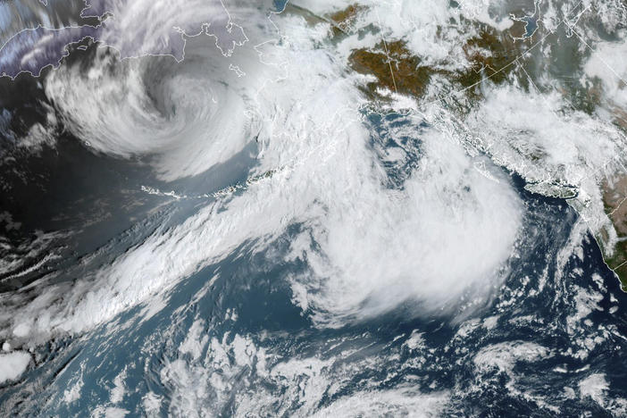 This image provided by the National Hurricane Center and Central Pacific Hurricane Center/National Oceanic and Atmospheric Administration shows a satellite view of Alaska on Friday. On the outlying Adak Island, wind gusts reached 75 mph.