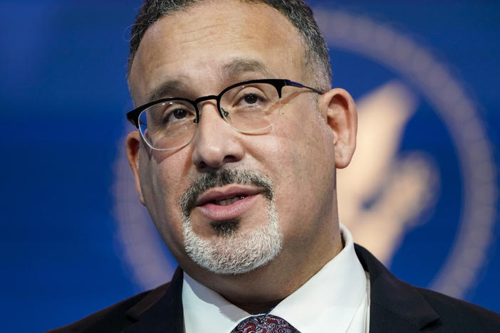 U.S. Secretary of Education Miguel Cardona spoke to NPR during the Pittsburgh stop of his back-to-school bus tour.