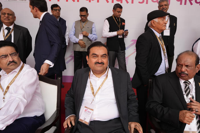 Gautam Adani (center) attends the UP Investors Summit in the northern Indian state of Uttar Pradesh, on June 3.