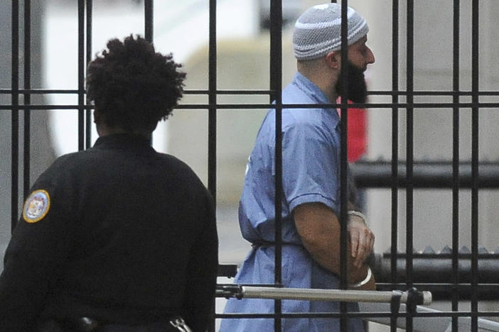 Adnan Syed enters a Baltimore courthouse prior to a hearing on Feb. 3, 2016. A court hearing has been set for Monday to consider a request from prosecutors to vacate his 2000 murder conviction.