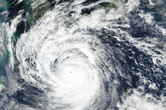 This Saturday, Sept. 17, 2022 satellite image released by NASA shows Typhoon Nanmadol, which is approaching southwest Japan. (NASA Worldview, Earth Observing System Data and Information System (EOSDIS) via AP)