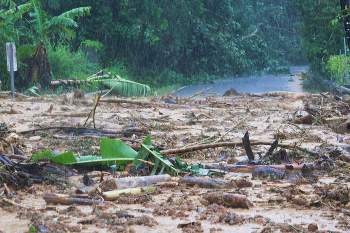 A road is blocked by a mudslide caused by Hurricane Fiona in Cayey, Puerto Rico, on Sunday.