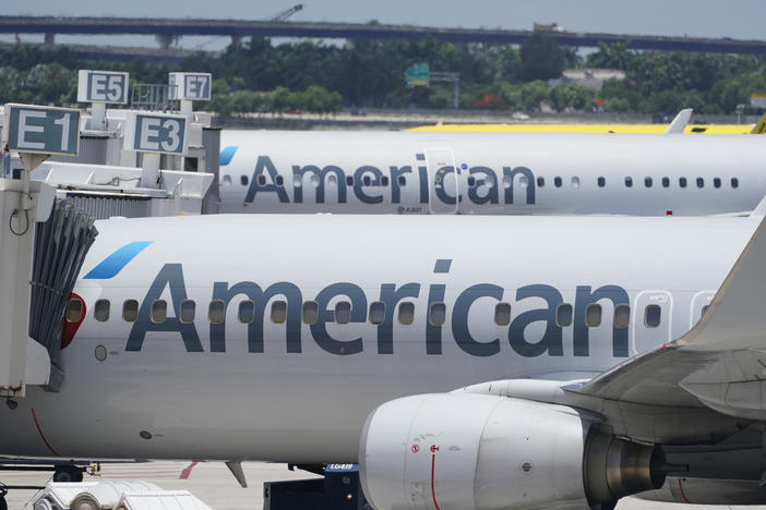 Two American Airlines Boeing 737s are shown at the Fort Lauderdale-Hollywood International Airport in Fort Lauderdale, Fla., in 2022. Hackers gained access to personal information of some customers and employees at American Airlines.