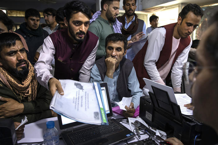 Afghan Special Immigrant Visa applicants crowd into the Herat Kabul Internet cafe, seeking help applying for the SIV program on Aug. 8, 2021, in Kabul, Afghanistan. The Taliban took over Afghanistan a week later. More than 74,000 applicants remain in the backlog of the SIV program, designed to help those who served the U.S. overseas.