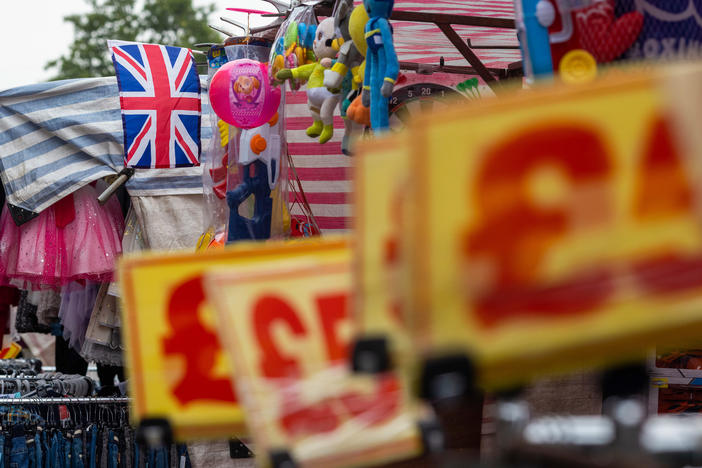A British Union Jack flies above a clothing market stall in Barking, U.K., last week.