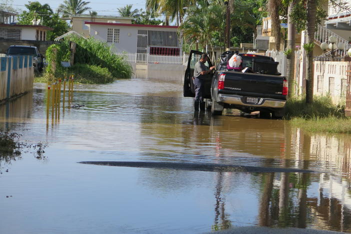 Floodwaters in many Puerto Rico neighborhoods, like Toaville, are still around two days after Hurricane Fiona crawled across the island.