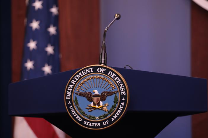 The Department of Defense logo is seen on the desk ahead of the press conference on Jan. 14, 2020.