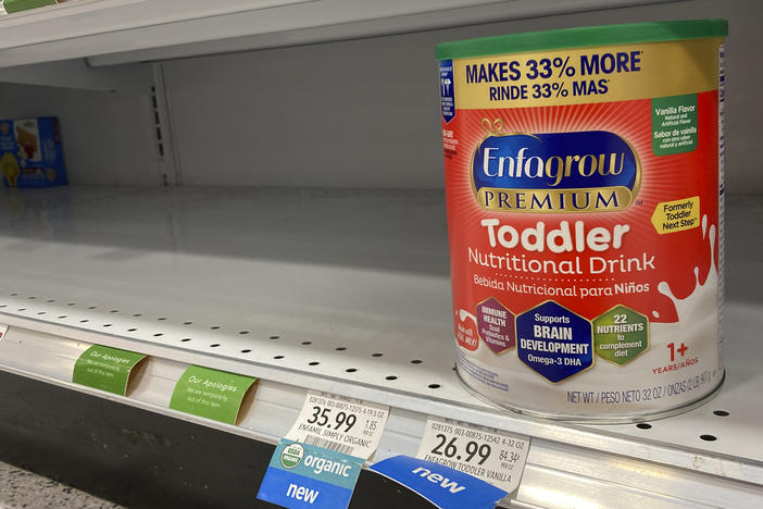 A photo from June 17 shows empty formula shelves at a supermarket in Florida. An internal review found several factors contributed to the national baby formula shortage, but no one person or agency was listed as at fault.