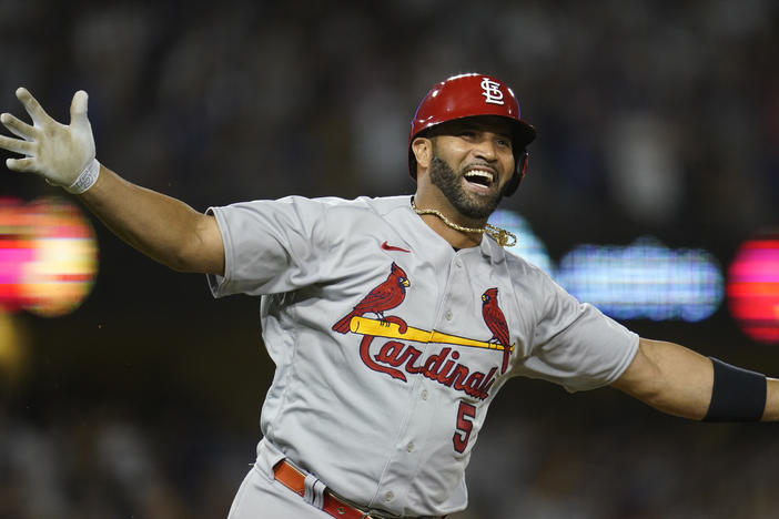 The St. Louis Cardinals' Albert Pujols watches after hitting his 700th career home run on Friday in a game against the Los Angeles Dodgers.