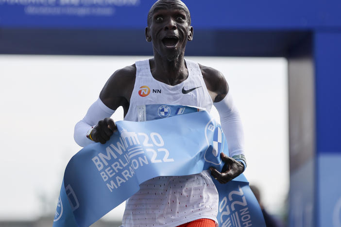 Kenya's Eliud Kipchoge crosses the line to win the Berlin Marathon in Berlin on Sunday.