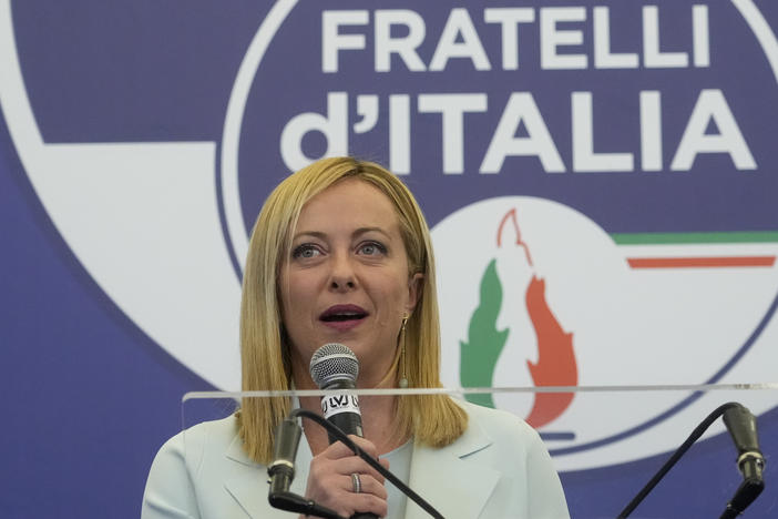Far-right party Brothers of Italy's leader Giorgia Meloni speaks to the media at her party's electoral headquarters in Rome on Sunday.