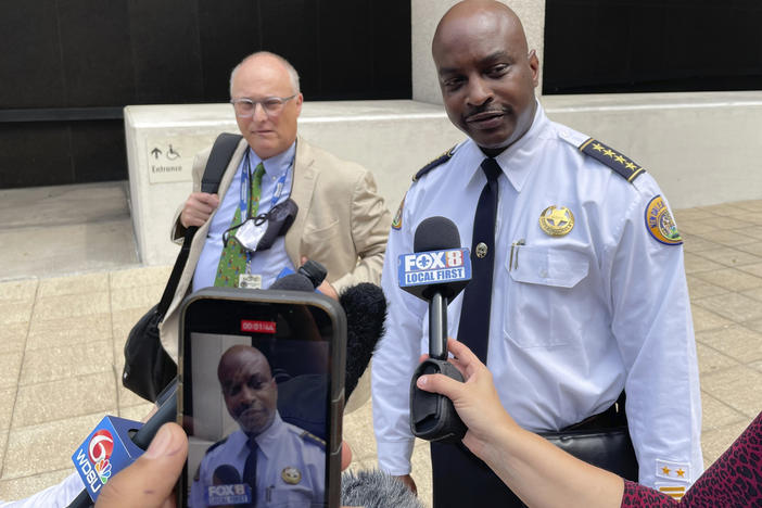 New Orleans Police Superintendent Shaun Ferguson talks to reporters outside the federal courthouse in New Orleans on Aug. 17, 2022. Hoping to beef up a dwindling police force amid a rise in violent crime, New Orleans officials announced a three-year $80 million plan Thursday, Sept. 8, 2022, offering raises for all officers, free health care and $30,000 in incentive payments for new hires.