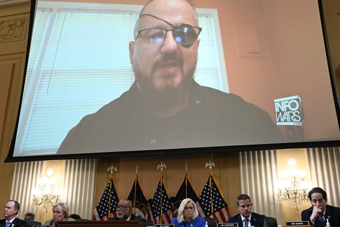 Stewart Rhodes, founder of the Oath Keepers, is seen on a screen during a House Select Committee hearing to Investigate the January 6th Attack on the Capitol in June.