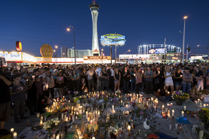 Mourners attend a vigil in Las Vegas following the Oct. 1, 2017, mass shooting at the Route 91 Harvest country music festival.