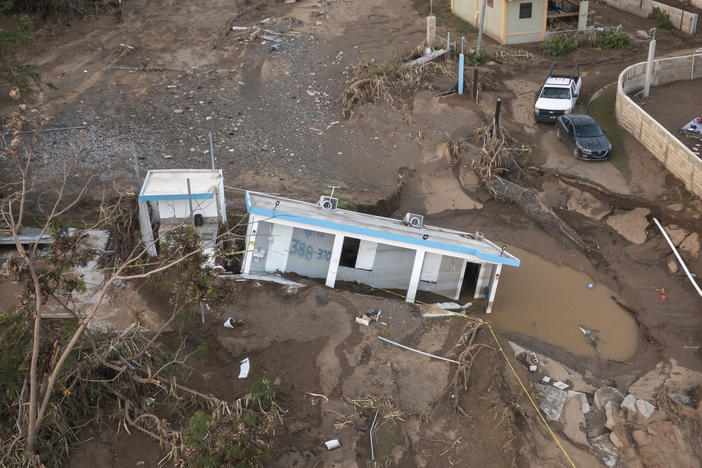 A house lays in the mud after it was washed away by Hurricane Fiona at Villa Esperanza in Salinas, Puerto Rico, Wednesday, Sept. 21, 2022.