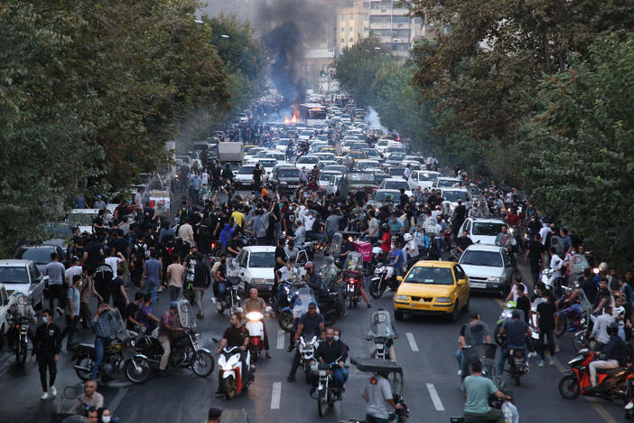 A picture obtained by AFP outside Iran on Sept. 21 shows Iranian demonstrators in Tehran during a protest for Mahsa Amini, days after she died in police custody.