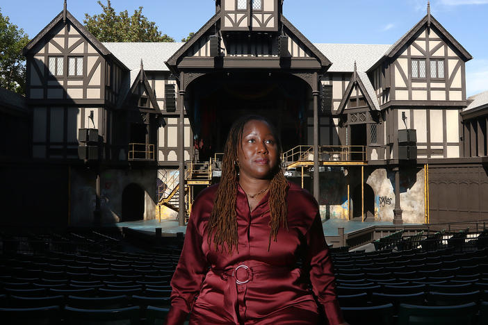 Oregon Shakespeare Festival Artistic Director Nataki Garrett stands inside the Allen Elizabethan Theatre in Ashland, Ore. She recently programmed her first full season but not everyone has embraced her new approach.