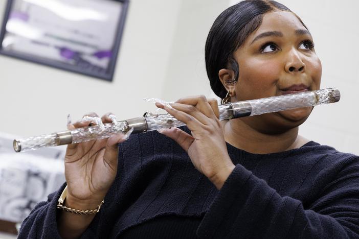 Lizzo plays President James Madison's crystal flute in the flute vault at the Library of Congress in Washington, D.C. on Sept. 26, 2022.