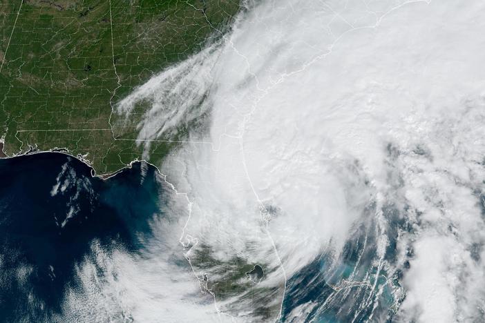 Tropical Storm Ian will regain some of the power it lost passing over land as it, returning to hurricane status later Thursday, according to the National Hurricane Center. It's seen here shortly before noon ET.