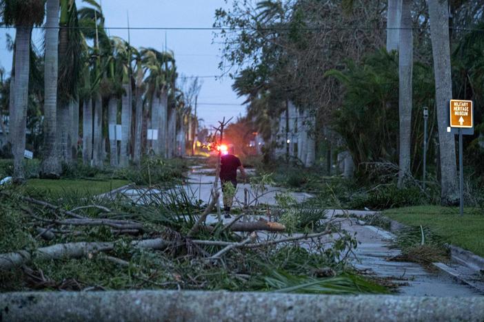 Hurricane Ian left debris in Punta Gorda, Fla., after it made landfall. Storms like Ian are more likely because of climate change.
