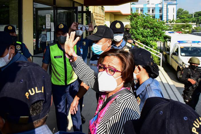 Former Philippine Senator and human rights campaigner Leila de Lima, a high-profile critic of former President Rodrigo Duterte and his deadly drug war, arrives at her hearing on illegal drug charges at the Muntinlupa Trial Court in Manila on Aug. 26.