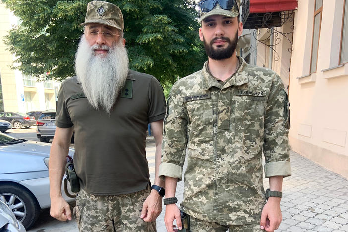 Asher and David Cherkaskyi, Ukrainian Orthodox Jews who are father and son and have both been on the front lines in Ukraine's fight against Russian occupation, in Dnipro in July.