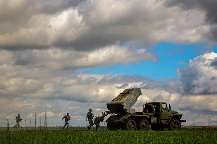 Soldiers prepare to fire BM-21 Grad rocket launcher toward Russian positions in Ukraine's eastern Donetsk region on Monday. Russia intends to annex Donetsk but Ukrainian forces retook Lyman, a strategic city in the region, on Saturday.