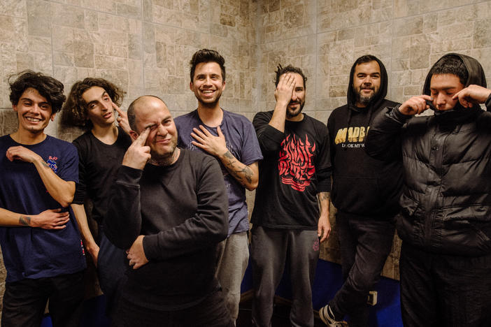 The band Hacía la Victoria, Spanish for "Onward to Victory," after rehearsal in Santiago, Chile, on Aug. 31. All of the musicians in the band sustained serious eye injuries during clashes with police who used tear gas and shotguns against anti-government protesters in 2019. From left: Camilo Galvez, Vicente Pascal, Sergio Concha, Gustavo Gatica, Cesar Galloso, Andrés López, Miles Camus.