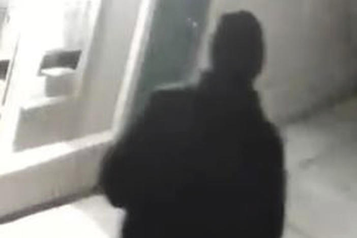 Stockton Police Department officials released this undated surveillance image of a person of interest. The figure appears to match the description of the only surviving victim of a suspected serial killer who has fatally shot six people.