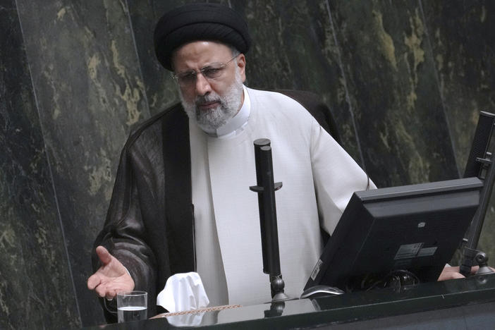 Iranian President Ebrahim Raisi addresses the parliament in a vote of confidence session for his proposed labor minister in Tehran, Iran, Tuesday, Oct. 4, 2022.