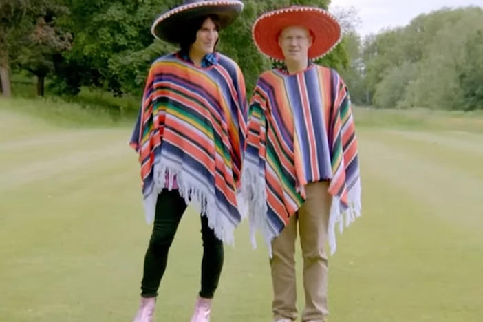 <em>The Great British Bake Off</em> hosts Noel Fielding and Matt Lucas opening the "Mexican Week" episode while wearing sombreros and serapes.