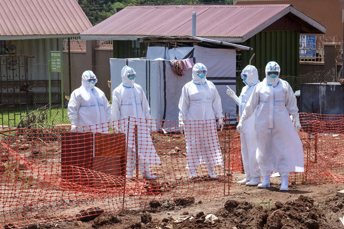 Doctors walk in the Ebola isolation section of Mubende Regional Referral Hospital, in Mubende, Uganda, on Sept. 29. Ugandan health officials have declared an Ebola outbreak in several regions of the country.