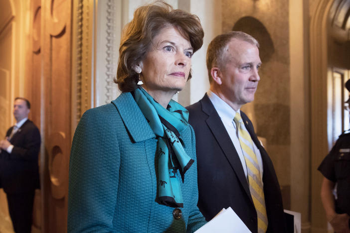 Sen. Lisa Murkowski, R-Alaska, left, and Sen. Dan Sullivan, R-Alaska, leave the chamber after a vote on Capitol Hill in Washington on May 10, 2017. Two Russians who said they fled the country to avoid compulsory military service have requested asylum in the U.S. after landing on a remote Alaskan island in the Bering Sea, Alaska U.S. Sen. Lisa Murkowski's office said Thursday, Oct. 6, 2022.