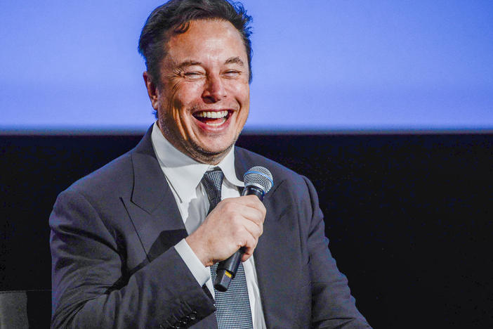 Elon Musk has until Oct. 28 to close the deal to purchase Twitter, a judge ruled on Thursday. Here, the Tesla CEO smiles while on stage at an event in Norway in August.