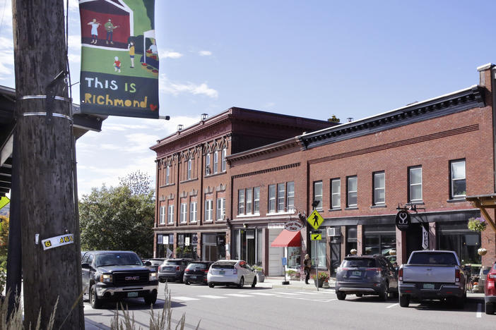 A pickup rolls through downtown Richmond, Vt., on  Wednesday. A town employee is under fire for lowering fluoride in the drinking water below the state's recommended level.