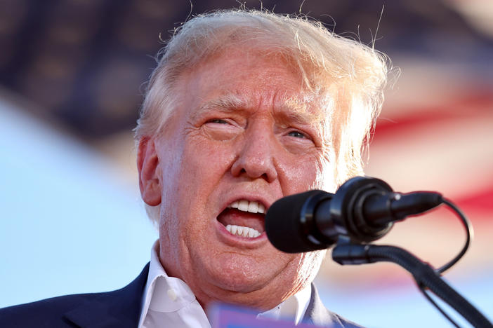 Former President Donald Trump speaks at a campaign rally in Mesa, Ariz., on Oct. 9. Trump is currently facing two Justice Department investigations, as well as an investigation in the state of Georgia.