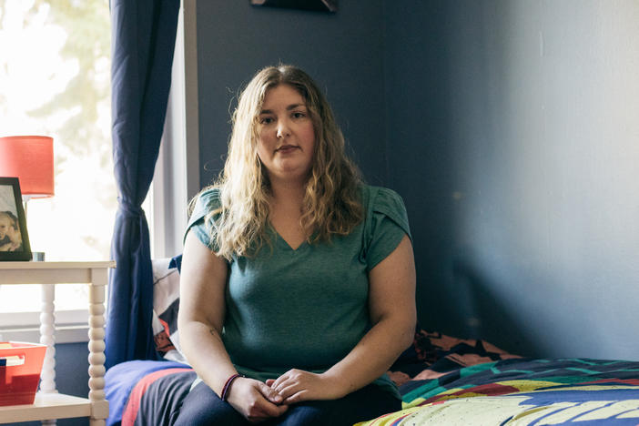 Katie-Jo Page sits in a room she has prepared for Mykyta, a Ukrainian boy her family was in the process of adopting, in Snohomish, Wash., on Oct 2.