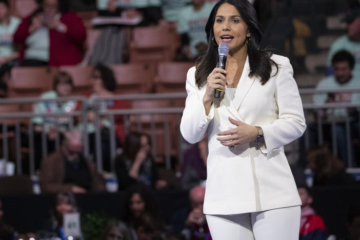 In this Feb. 8, 2020, file photo, Democratic presidential candidate Rep. Tulsi Gabbard, D-Hawaii, speaks during the McIntyre-Shaheen 100 Club Dinner in Manchester, N.H.