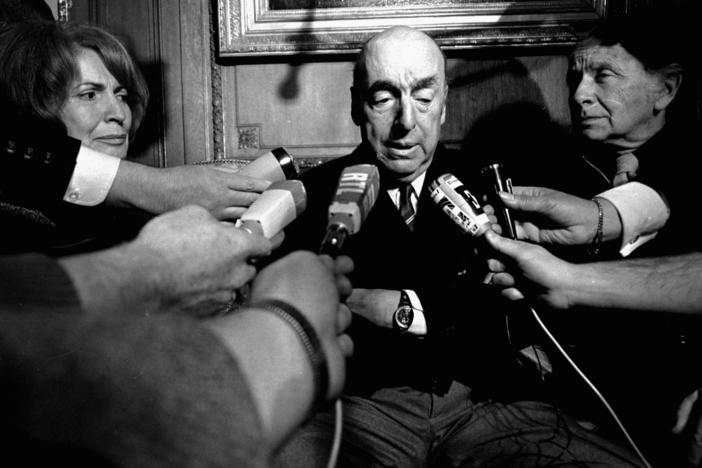 Pablo Neruda, then serving as Chile's ambassador to France, talks with reporters in Paris after being named winner of the 1971 Nobel Prize for Literature.