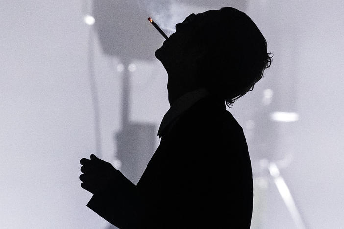 Matty Healy performs with The 1975 at the Leeds Festival in August 2022.